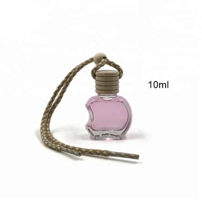 Customized color 10ml apple hanging rope wooden cap glass car perfume bottle 