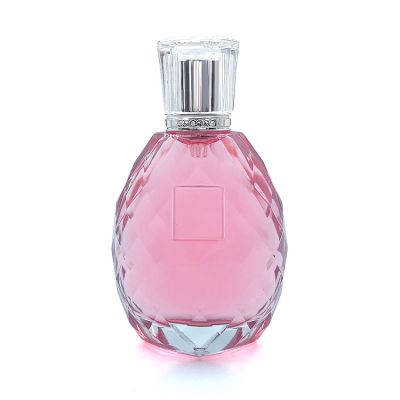 Shiny embossed 100 ml clear perfume glass spray bottle with crimp atomizer 