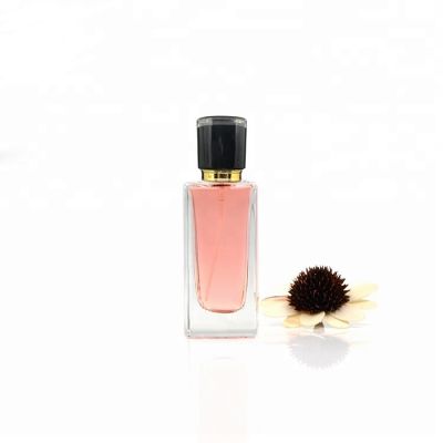 Top quality 50ml crimp neck perfume glass bottle design with plastic cap 