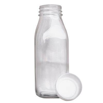 Factory Price Clear Custom 16 oz glass bottles for milk with Label and Screw Cap 