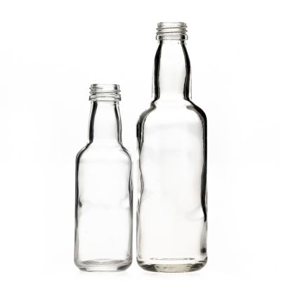 50 ml 100ml Round Small Clear Beverage Juice Bottles Food Grade Empty Glass Wine Bottle for Sale