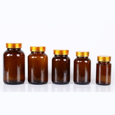 10oz round wide mouth amber medicine glass bottle with lined black plastic cap