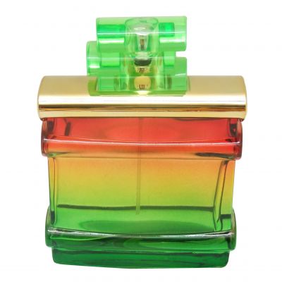 wholesale unique shaped perfume glass bottles for sale with cap gradient color bottles factory