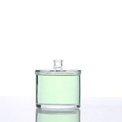 high quality clear empty 100ml round glass perfume bottle with silvery pump sprayer 