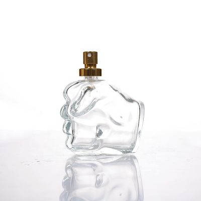 Wholesale Unique Shape Transparent Empty Fist-shaped Perfume Glass Bottle 80ml 