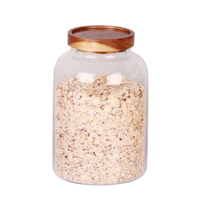 Manufacture Glass jar supplier Round high borosilicate glass cookie jars weed jar glass with screw wooden lid for food storage 