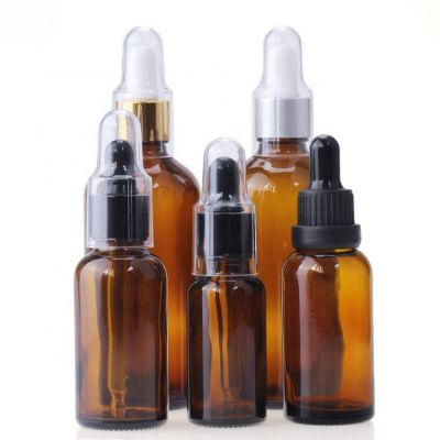 wholesales 25ml essential oil bottle with dust cap fancy amber glass dropper bottle 