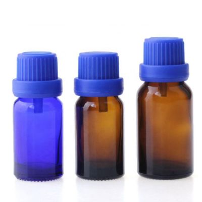 creative design high quality 10ml amber blue glass essential oil bottle packaging with blue tamper proof cap seal 