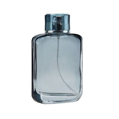 Light blue flat perfume glass bottle 