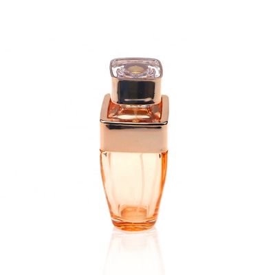 Luxury Empty 100ml Trapezoidal Irregular Orange Perfume Glass Bottle Special Glass Bottle Spray Pump 