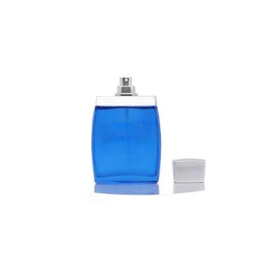 Wholesale stock blue painting 100ml square perfume bottle with aluminum cap 