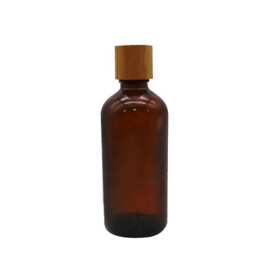 Wholesale 100ml Round Amber Glass Cosmetic Bottles Esseontial oil with Bamboo Wooden Lid 