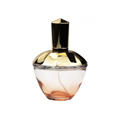 Hot Selling Gold Gradient Round Perfume Glass Bottle 100 ml With Unique Cap For Women 