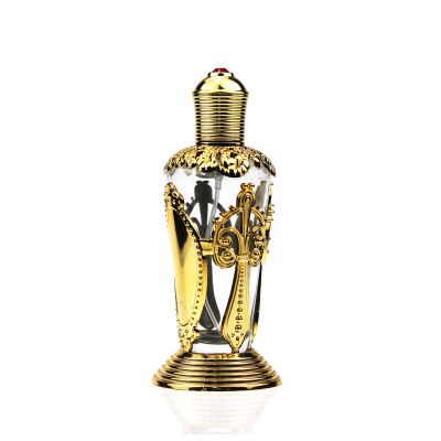 China New Design Unique Shaped Gold Luxury Glass Perfume Spray Bottle 80 ml With Pattern 
