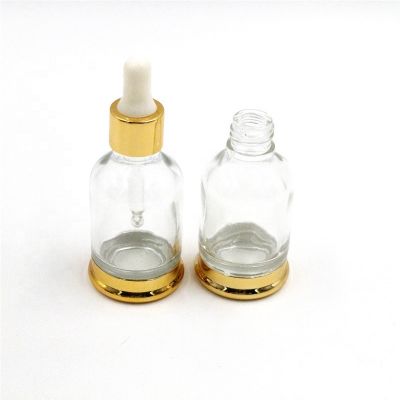 OEM/ODM Gold dropper empty bottle 30ml Cosmetic glass essential oil bottle can be printed 