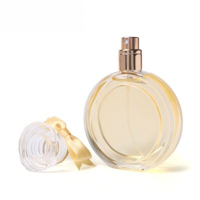 Elegant glass perfume bottle transparent spray small round perfume bottle