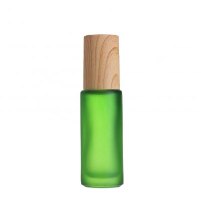 5ml green frosted perfume roll on eye cream cosmetics glass roller bottle with wood grain cap and glass roller ball 