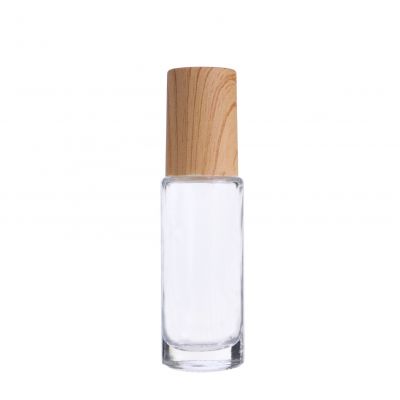 5ml clear empty eye cream cosmetics glass roller bottle with wood grain cap and glass roller ball