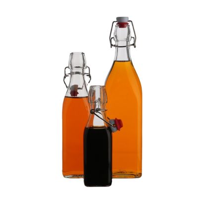Empty square shape fancy 1000 ml glass fruit tall beverage glass juice bottle with swing top 