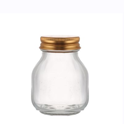 Custom unique shape storage transparent 70 ml bird's nest glass jar with metal lid 