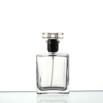 Wholesale 50ml custom logo empty square clear glass perfume bottle with spray 