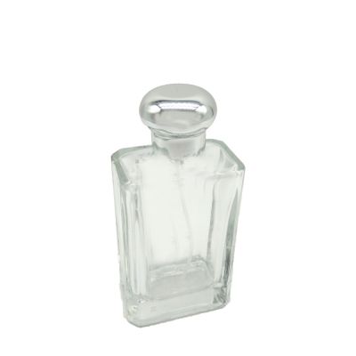 Hot selling middle collection perfume 70 ml clear rectangle perfume glass bottles for sale portable with silver round cap