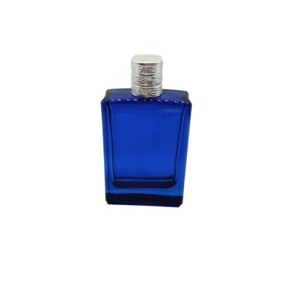 100 ml blue rectangle glass spray perfume bottle empty glass bottle genie collection perfume 