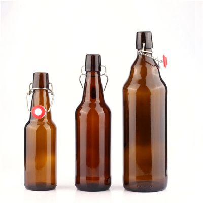 Custom good price 500 ml 1000 ml clear brown empty glass beer bottle with swing top 