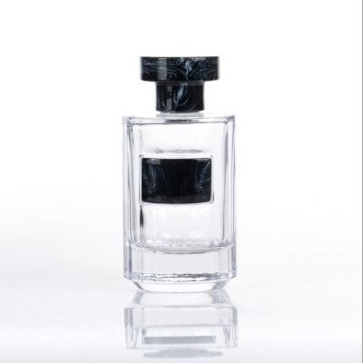 Manufacturer high quality glass bottle for perfume with marbled resin cap 