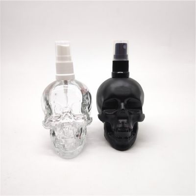 Wholesale customization of 130ml skeleton glass perfume bottle with plastic spray and lid 
