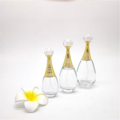 wholesale 30ml 60ml 100ml glass spray bottles oval perfume bottle with perfume atomizer and golden cover 
