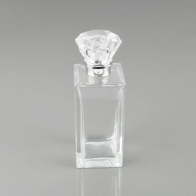 Bottle Manufacturer OEM Bottles Clear Perfume Glass Bottle With Diamond Shape Cap 