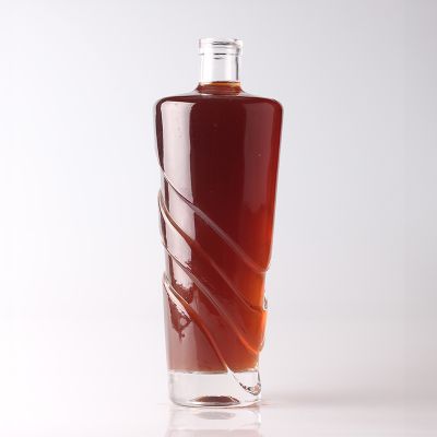 China supplier delicate rhombus embossed whiskey Transparent glass bottle 