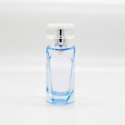Beautiful sky blue transparent square glass perfume spray bottle for sale 