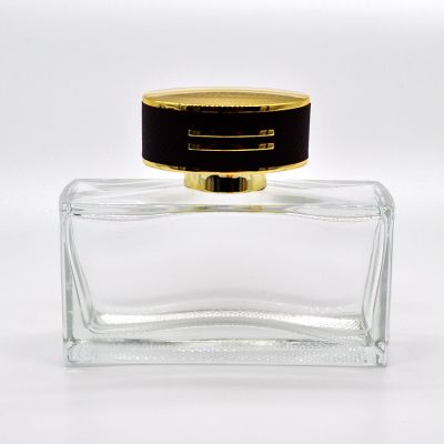 Modern design flat square 100ml glass perfume bottle with leather cover for sale 