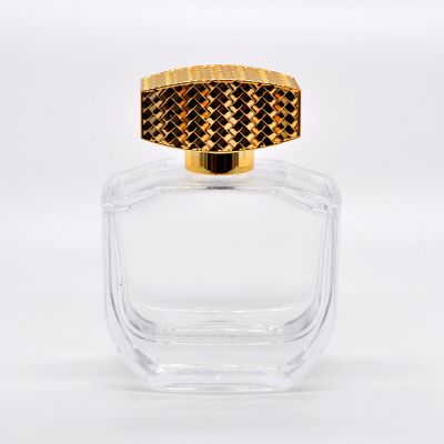 New design fancy glass perfume bottle 100 ml with gold cap 