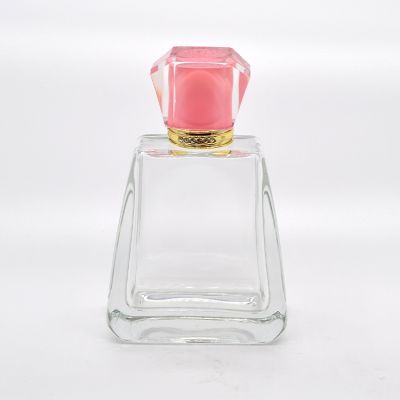 Factory supply hot women's exquisite design 100ml perfume glass bottle with cap 