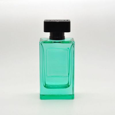 100ml empty high quality OEM customized transparent green rectangular glass perfume bottle with black cap 