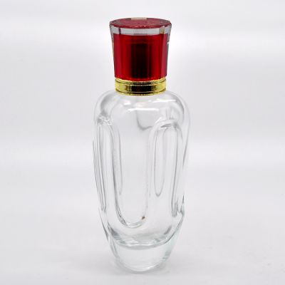 Customized unique styling perfume transparent glass 100ml luxury perfume bottle 