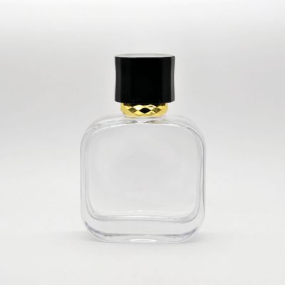 Empty high quality OEM customized design transparent glass perfume bottle with gold sprayer 