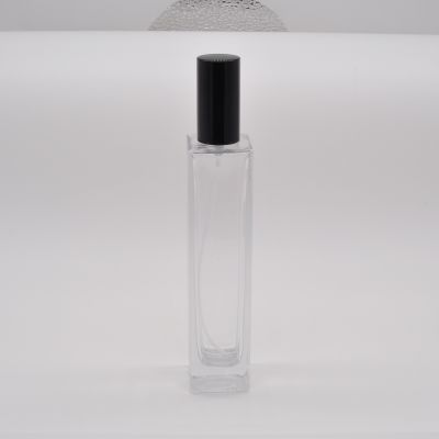 Empty designed high quality wholesale clear OEM rectangle refillable glass perfume bottle with pump mist sprayer 