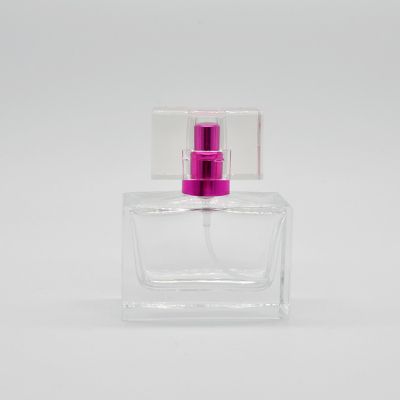 Empty wholesale clear OEM 30ml refillable rectangular glass perfume bottle with pump mist sprayer 