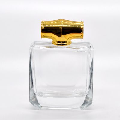 Modern design flat square transparent glass perfume bottle with golden design cap 