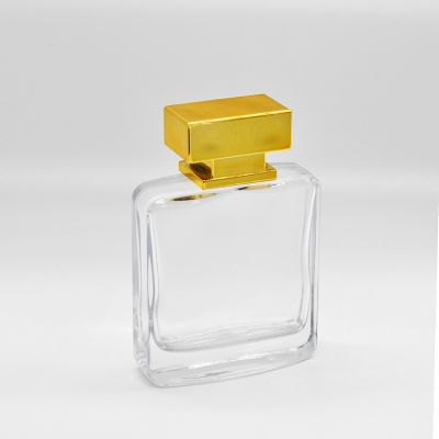 Hot sale wholesale gold cover 50ml exquisite square glass perfume bottle 
