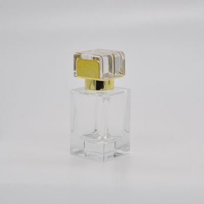 High quality Empty rectangular transparent glass perfume bottle with pump sprayer gold cap