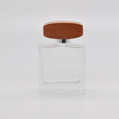 Unique design square glass perfume clear spray bottles with wooden cover 
