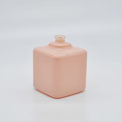 Wholesale orange color ODM custom fancy design 50ml Square glass perfume bottle 
