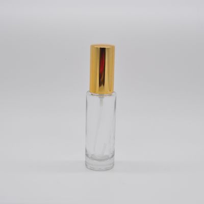Empty wholesale clear OEM 25ml refillable glass perfume bottle with pump mist sprayer