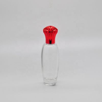 50ml Empty high quality transparent OEM glass perfume bottle with mist sprayer red cap 