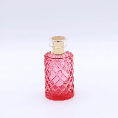 round cylindrical with irregular surface painting empty perfume glass bottles 
